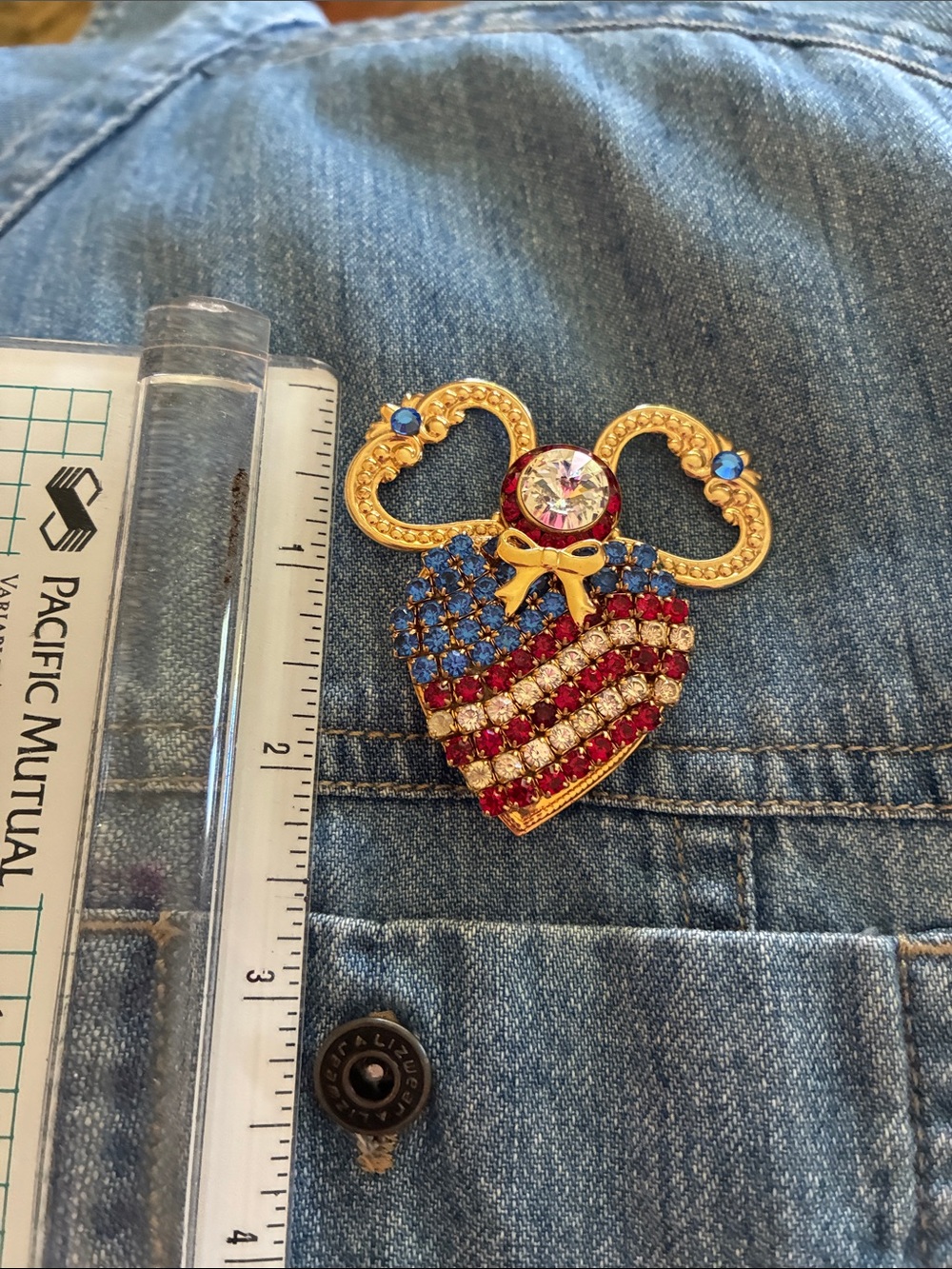 Patriotic angel pin with red, white and blue rhinestones